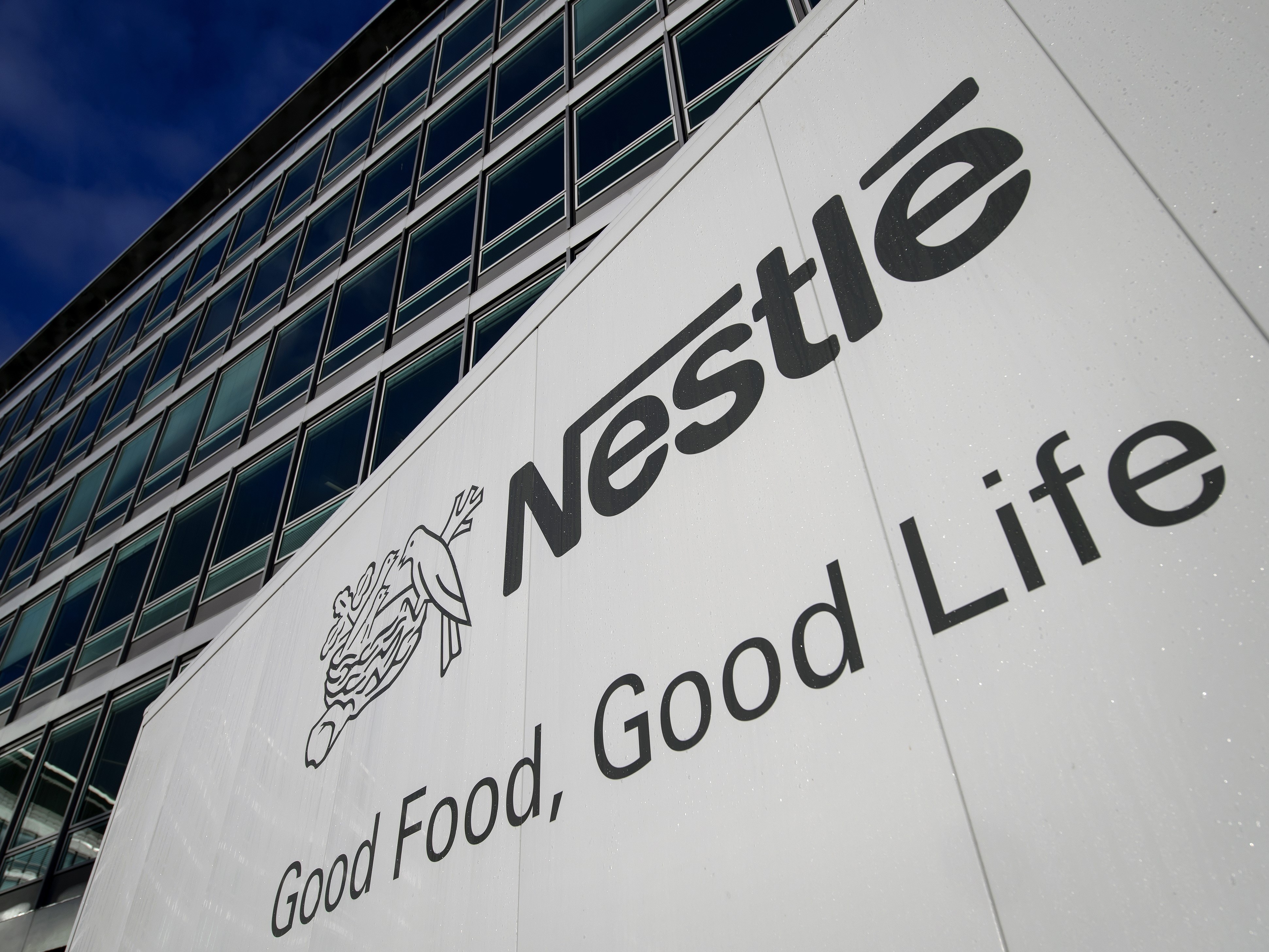 Global food giant Nestle is among several major employers that have announced increases in family leave benefits this year. (AFP/Getty Images)
