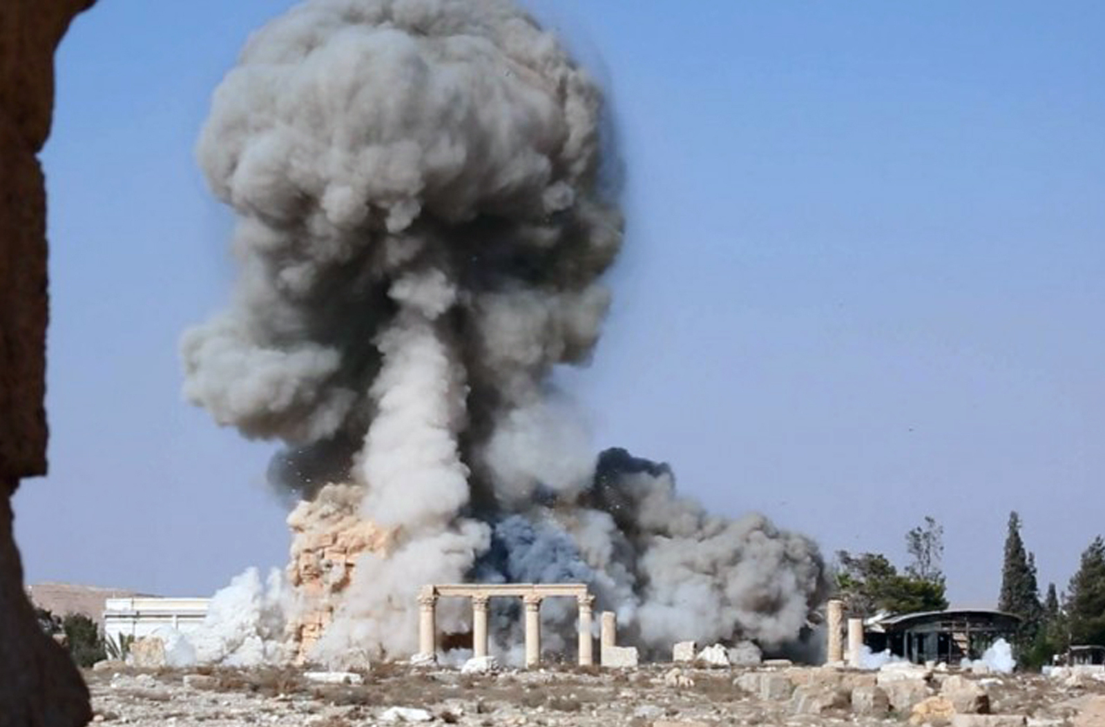 An undated image, released by the self-declared Islamic State, apparently shows the destruction of another famous site at Palmyra: the 2,000-year-old temple of Baalshamin. The image is consistent with reports that the militant group detonated explosives around the temple about a week before destroying the Temple of Bal.
