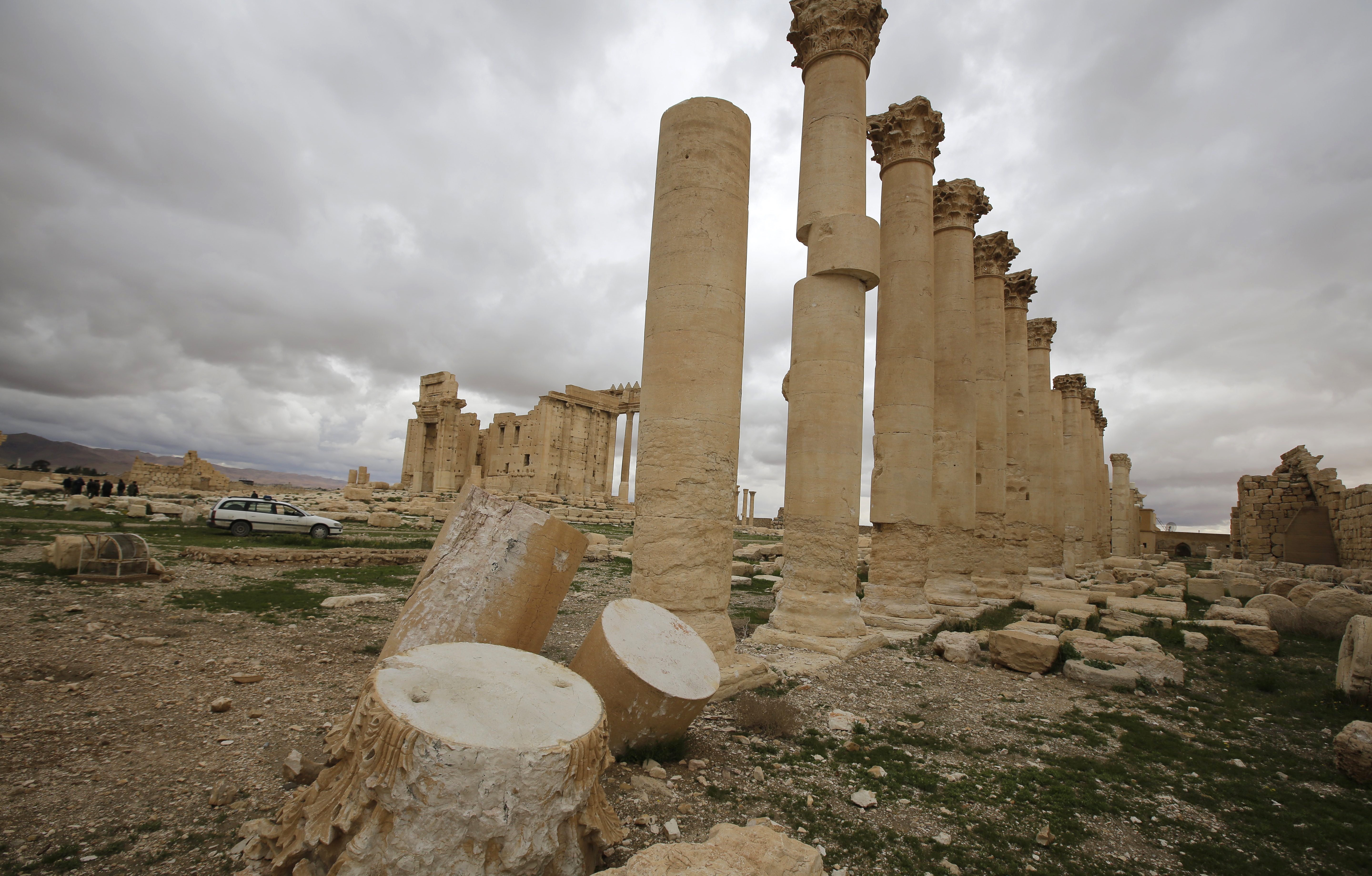 The Temple of Bel in Palmyra had already sustained some damage from artillery shells in March 2014, when these columns in the temple courtyard were photographed. The ancient temple stood at a cultural crossroads, showing influences from Greco-Roman and Persian traditions, and was one of Syria's most famous archaeological sites. It was destroyed late in August of 2015.