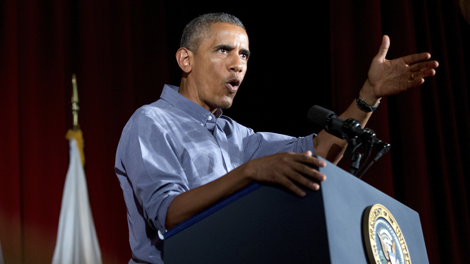 President Obama has signed an executive order that requires federal contractors to offer their employees up to seven days of paid sick leave per year. (Andrew Harnik/AP)