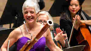 New York Philharmonic principal bassoonist Judith LeClair acknowledges applause at a concert at Avery Fisher Hall in New York.