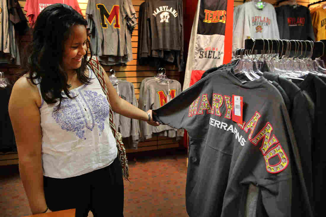 Alejandra Gonzalez browses in the bookstore at the University of Maryland in College Park, Md.