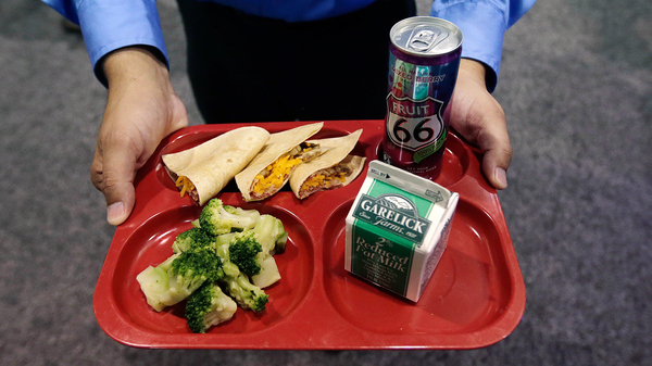 A school lunch tray featuring whole wheat tortillas at the School Nutrition Association conference in July 2014. The association is asking Congress to relax the federal school nutrition standards in hopes of attracting more kids back to the school lunch line.