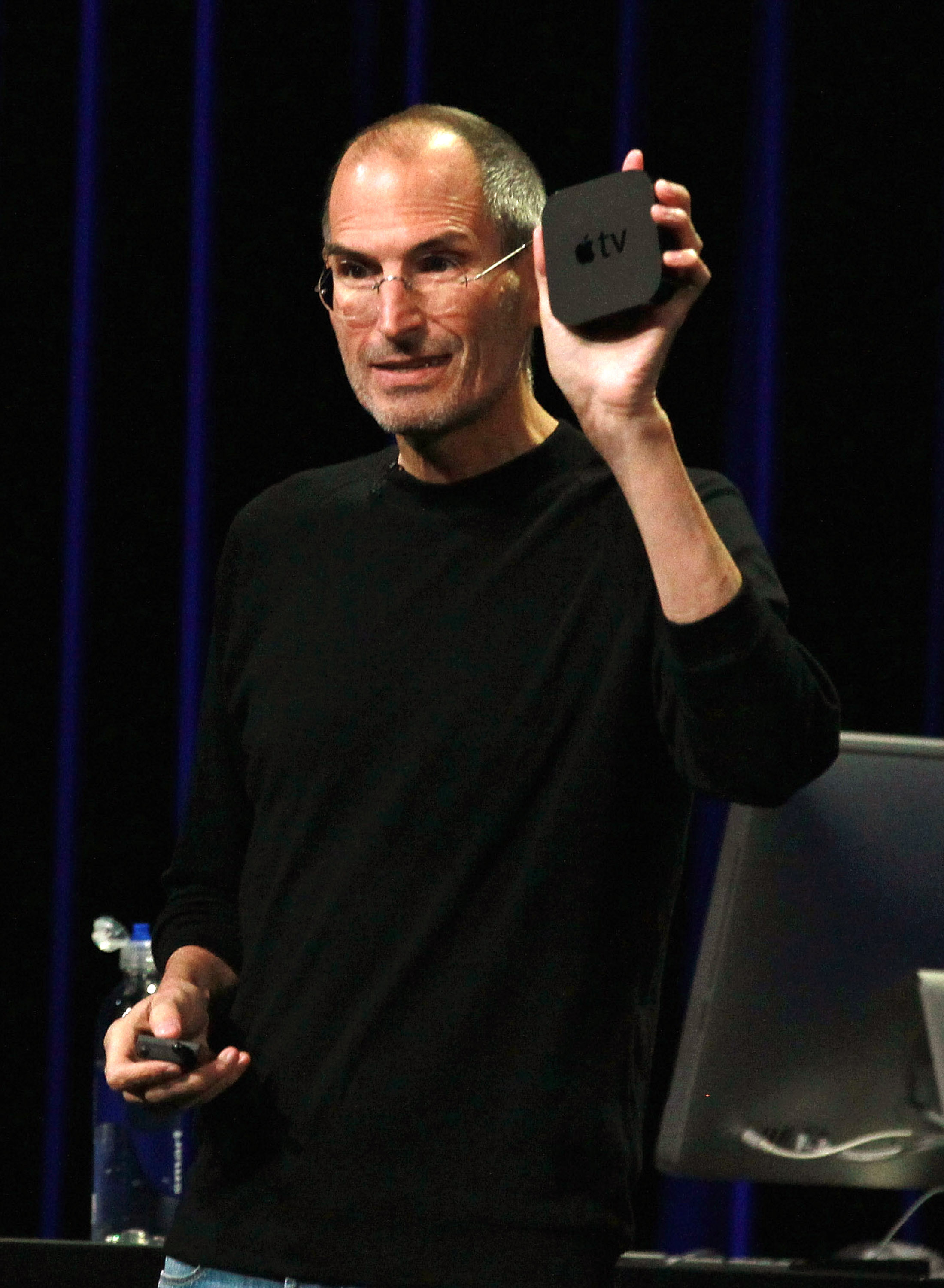 Steve Jobs shows off a second-generation Apple TV during a press event in September 2010.