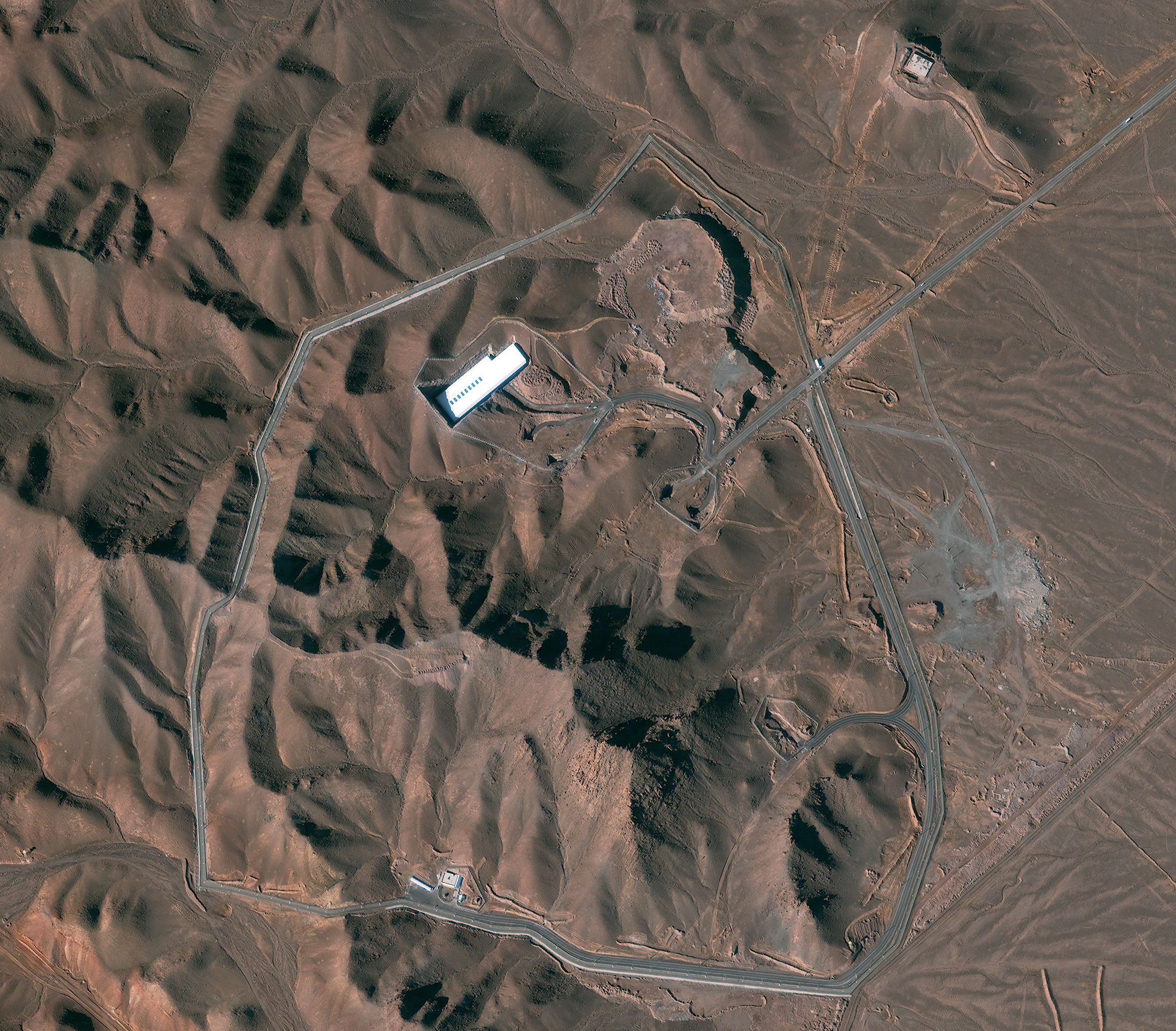 A satellite image shows the Fordow facility in Iran. Under an agreement with six world powers, Iran would stop enriching uranium at the facility.
