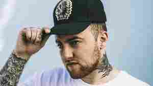 Mac Miller in Los Angeles in September. Note the Beats, Rhymes And Life tattoo on his right wrist.