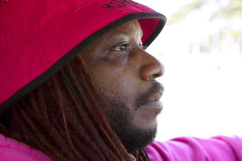 Deco Carter, who drives mostly for Lyft, a ride-hailing service, has been involved in two auto accidents that left him unable to work while his car was being repaired. (Alan Toth/KQED)