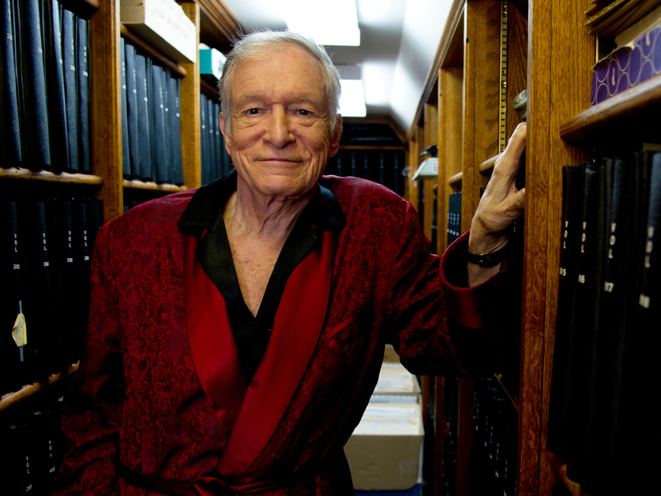 <em>Playboy</em> founder Hugh Hefner poses for a photograph at his home in Beverly Hills in 2011. (Kristian Dowling/AP)