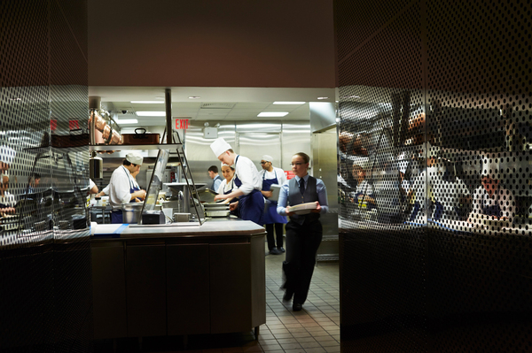 Staff in the kitchen of The Modern, a restaurant operated by Meyer's Union Square Hospitality Group and located in the Museum of Modern Art.