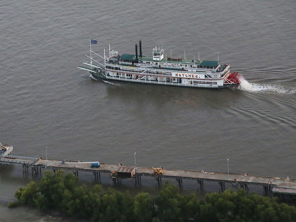 A steamboat drifts along the Mississippi River in New Orleans. A group called America's Watershed Initiative says "funding for infrastructure maintenance means that multiple failures may be imminent" for the lower Mississippi River basin.