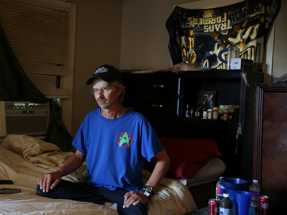 Joe Becker at his home in Abilene, Texas. Nearly two years after hurting his back at work, his benefits have stopped even though he's still in pain and in need of another surgery. (Dylan Hollingsworth for ProPublica)