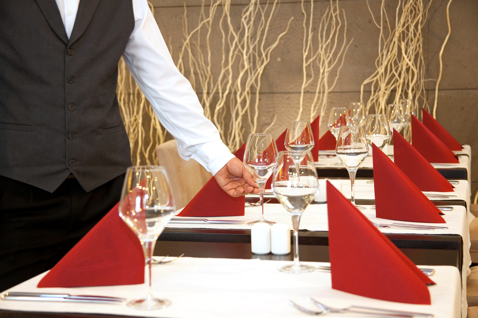 At fine-dining places, white workers overwhelmingly fill jobs with the heftiest salaries, while Latinos, blacks and other minorities have jobs with pay closer to the poverty level, a study finds. (iStockphoto)