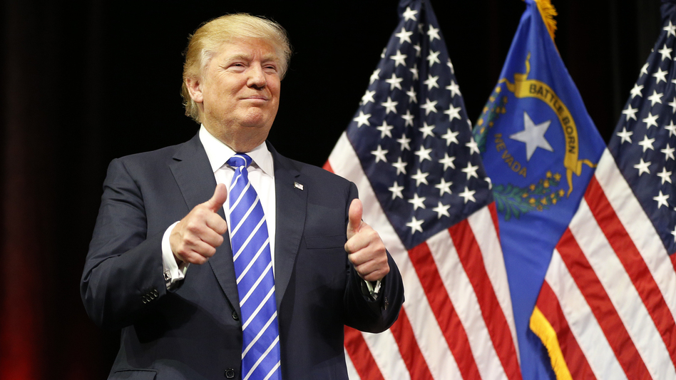 Republican presidential candidate Donald Trump speaks at a rally in Las Vegas. A Hispanic coalition is condemning NBC's <em>Saturday Night Live</em> for inviting Trump to host the show. (John Locher/AP)