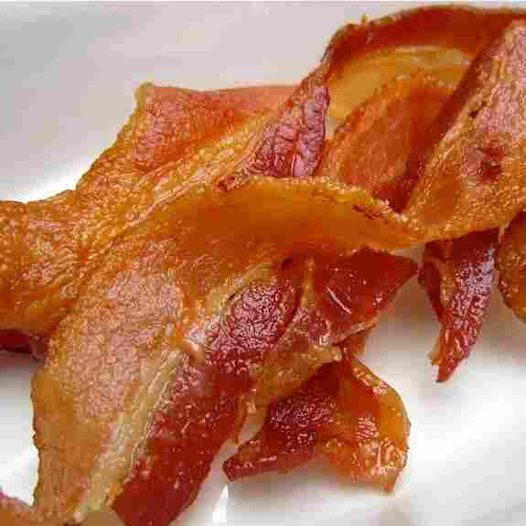 The World Health Organization has put bacon, hot dogs and sausages in the same category of cancer risk as tobacco smoking. The World Health Organization has put bacon, hot dogs and sausages in the same category of cancer risk as tobacco smoking.