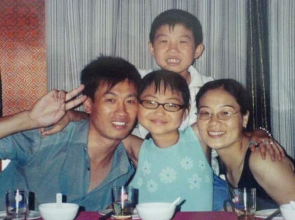 In 2005, when she was 12 years old, Ricki Mudd (center) traveled to China to meet her birth father Wu Jin Cai, birth brother Wu Chao and birth mother Xu Xian Zhen. Mudd had been given up for adoption after Wu Chao was born; her family wanted a son, and her parents were limited to one child. (Courtesy of Ricky Mudd)