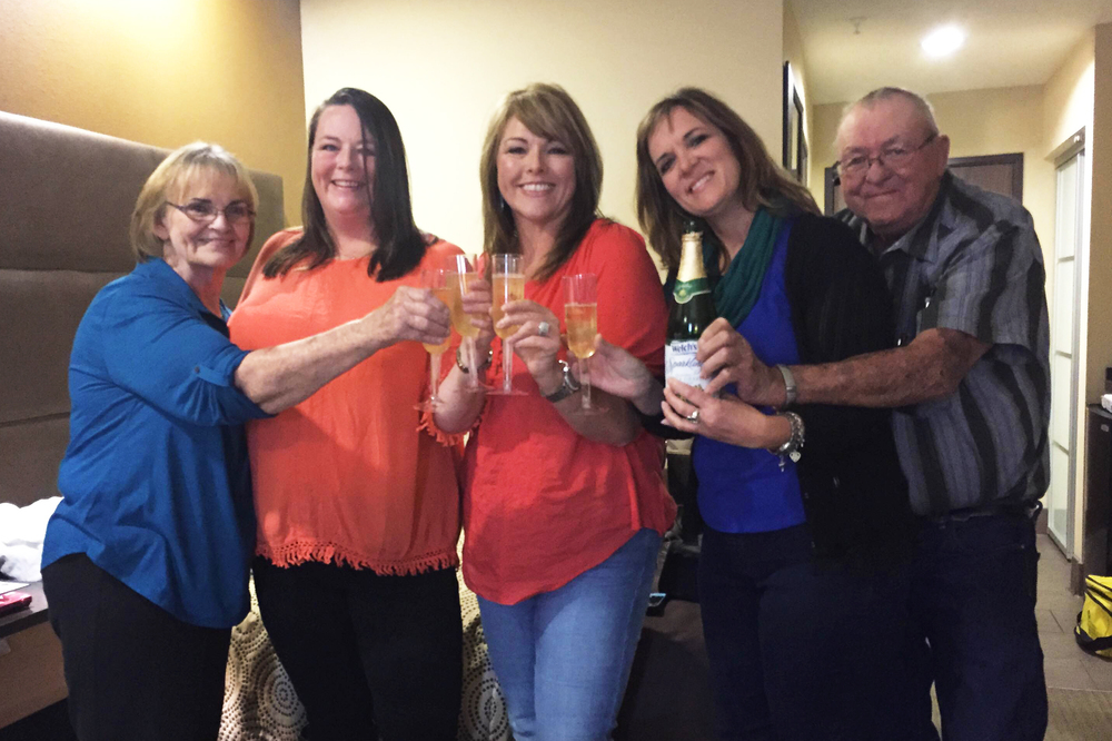 Dana Bowerman's family and best friend joined her to celebrate her release with sparkling grape juice Monday: Bowerman's mother, Rose West (from left); Bowerman, sister Paula Bailey, friend Michelle Elliott, stepfather Dwayne West. (Syeda Hasan for NPR)