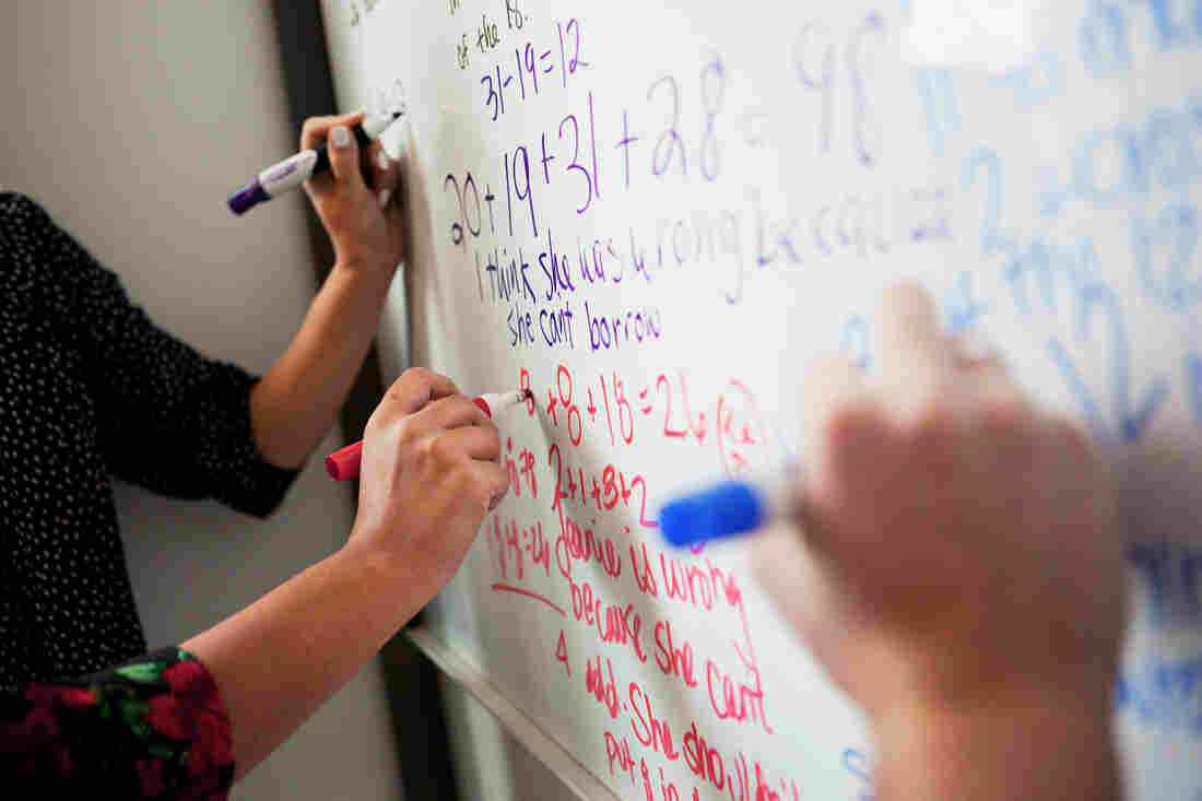 A Common Core sample problem is written on a whiteboard at NPR, in Washington, D.C.