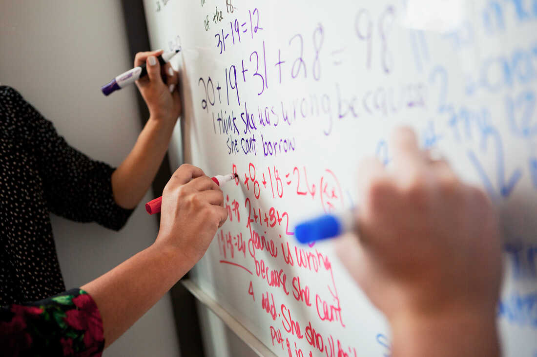 A Common Core sample problem is written on a whiteboard at NPR, in Washington, D.C.