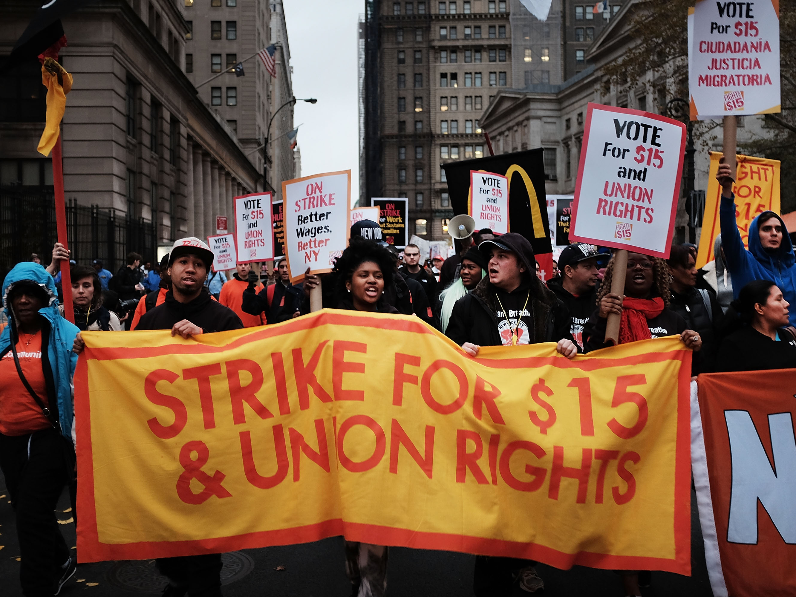 Low-wage workers and supporters protest for a $15 an hour minimum wage Tuesday in New York City as part of what organizers called a National Day of Action. (Getty Images)