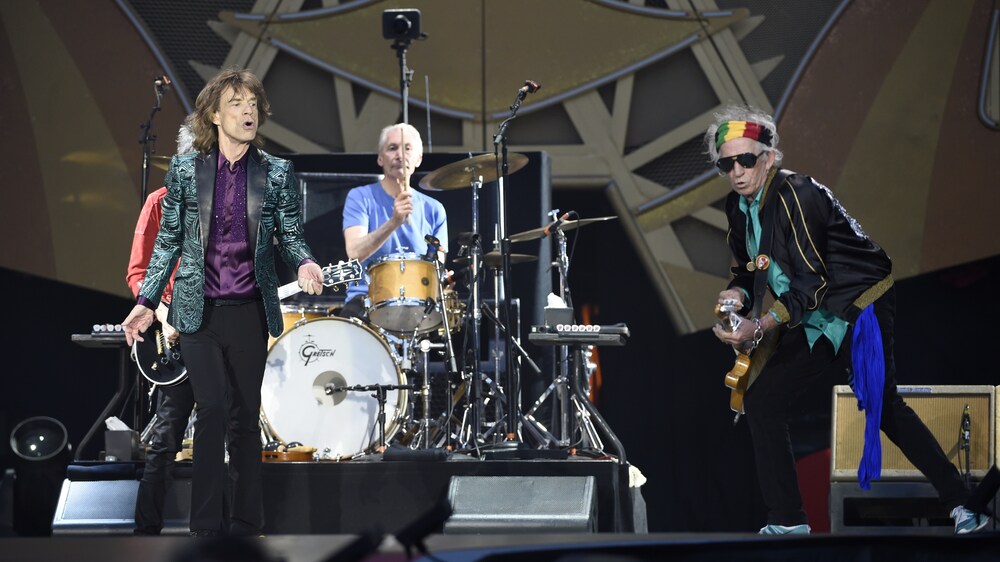 The Rolling Stones perform in June 2014 during a concert at the Stade de France in Saint-Denis, outside Paris. The brother of one of the victims of Friday's terrorist attacks in Paris would like the band to return to the city for his brother's funeral. (AFP/Getty Images)