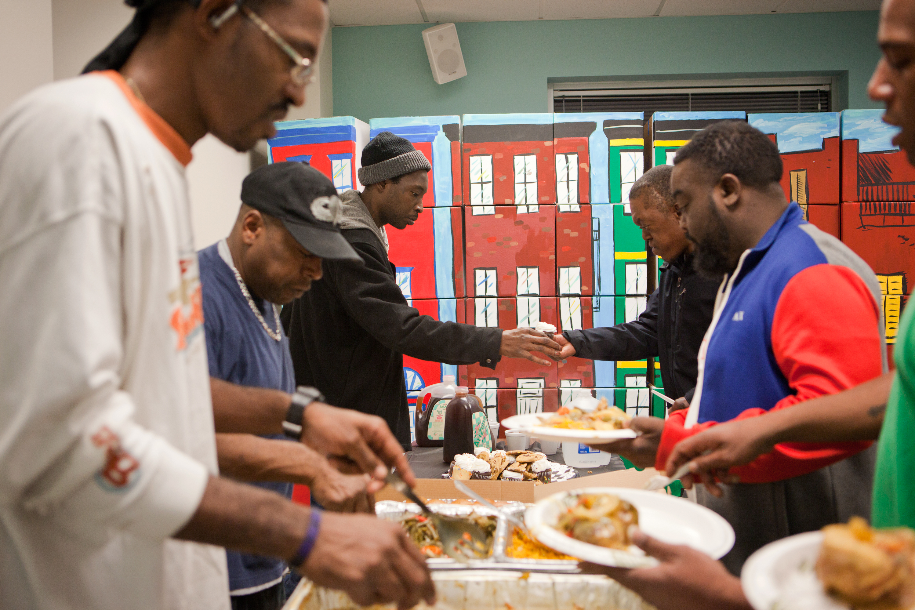 Participants are served dinner after their meeting. Maryland wants to expand its child support debt forgiveness program, hoping to help more parents to pay what they can.