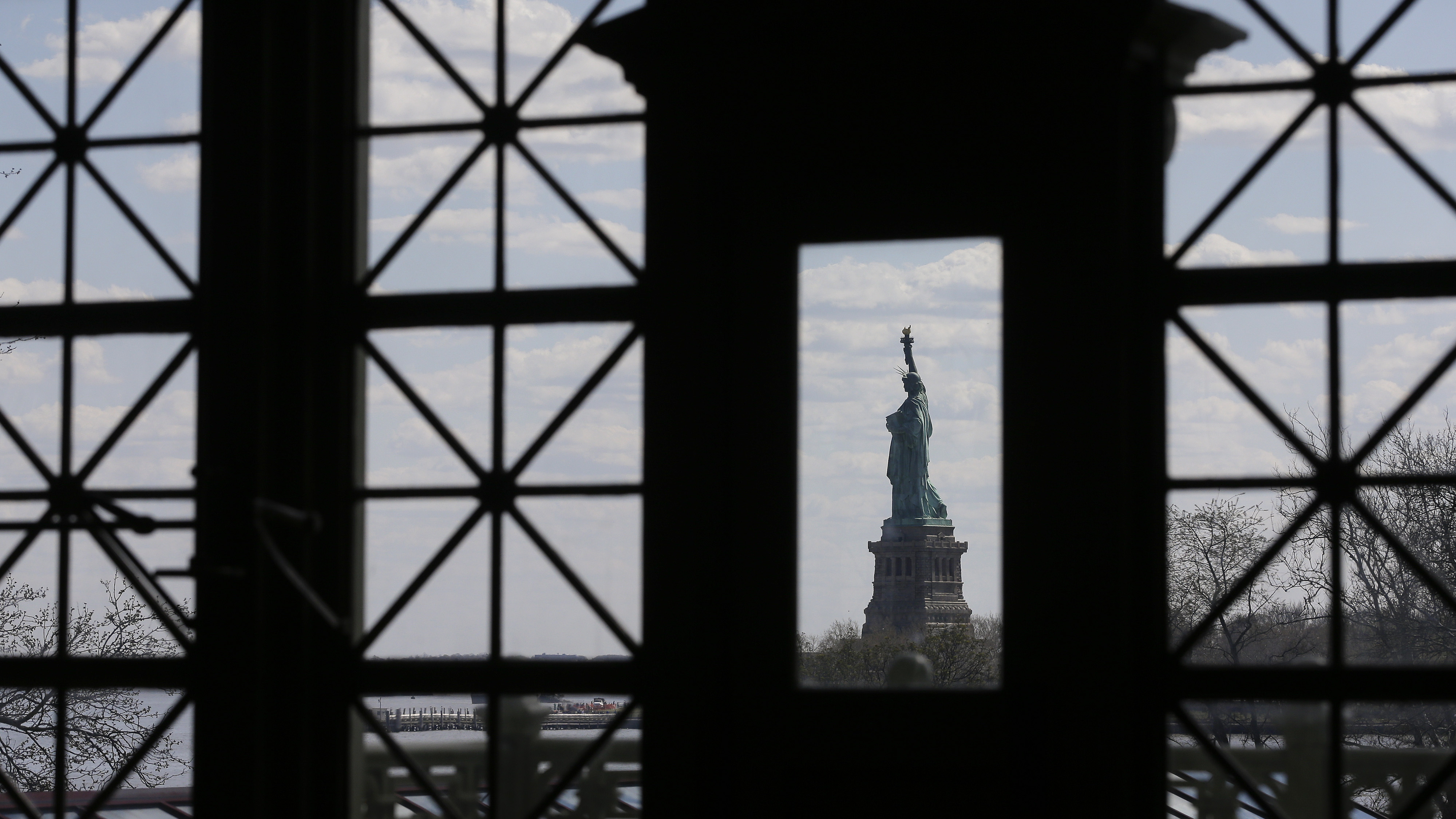 The Statue of Liberty, as seen through windows on the south side of the Great Hall at Ellis Island.