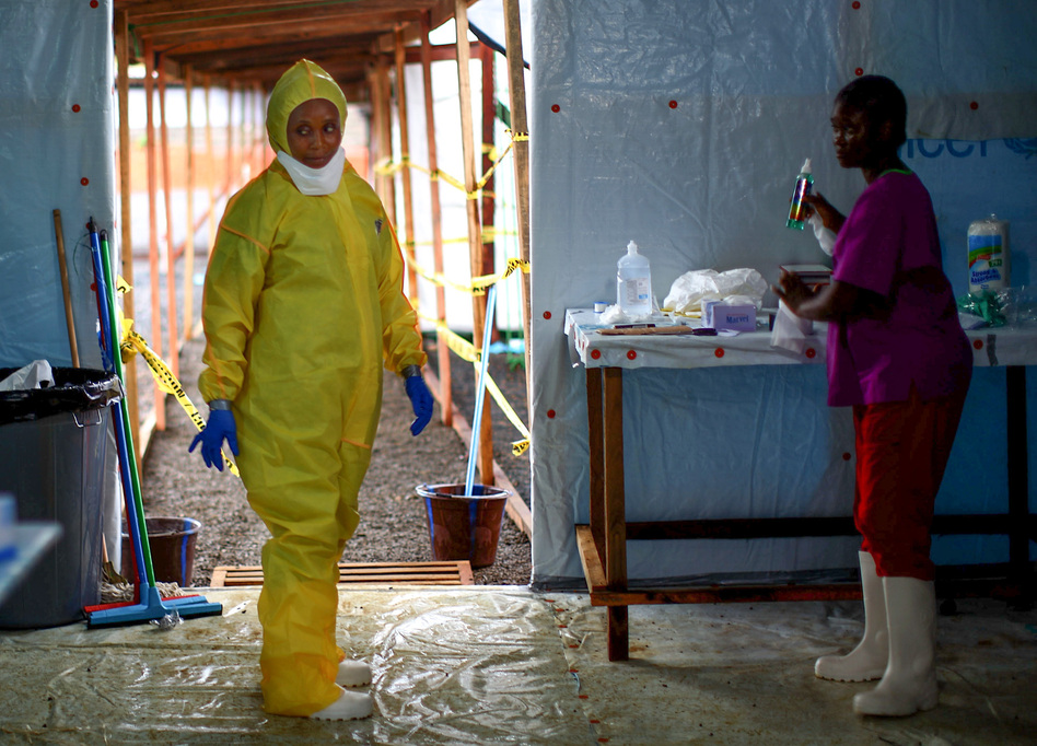 Some health workers in Liberia had stopped using the protective gear that was part of the Ebola routine. The photo above is from 2014, when the epidemic was at its peak. (David P. Gilkey/NPR)