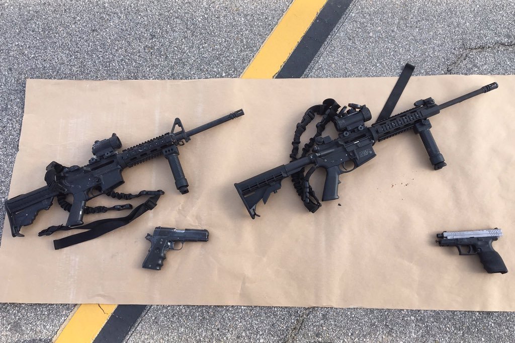 This image, released by the San Bernardino County Sheriff's office, shows some weapons and ammunition that were carried by the suspects in Wednesday's shooting.