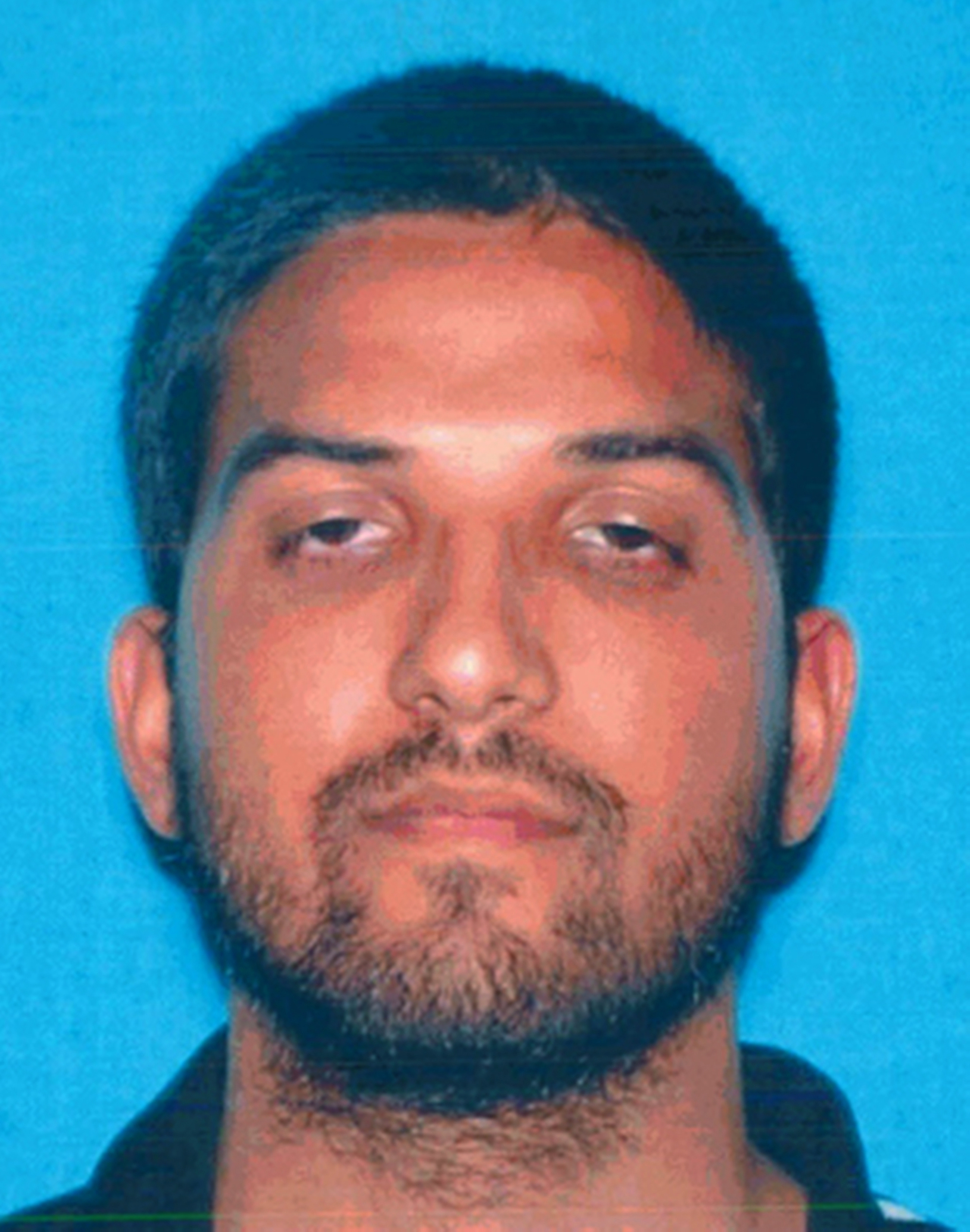 This undated photo provided by the California Department of Motor Vehicles shows Syed Rizwan Farook, who has been named as a shooting suspect in the San Bernardino shootings.