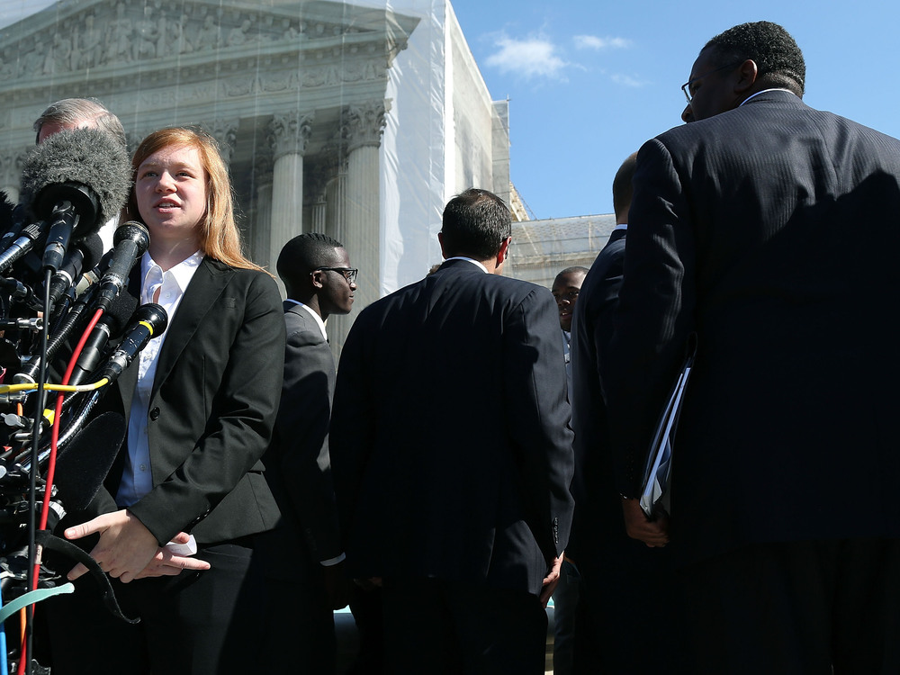 Abigail Noel Fisher, who challenged a racial component to University of Texas at Austin's admissions policy, speaks to the media outside the U.S. Supreme Court building during arguments in the case in October of 2013. (Getty Images)