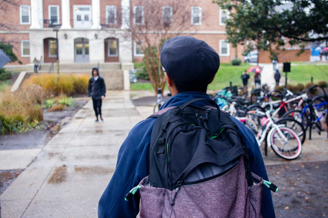 Rhys Hall, a senior at UMD, walks on the school's College Park campus.