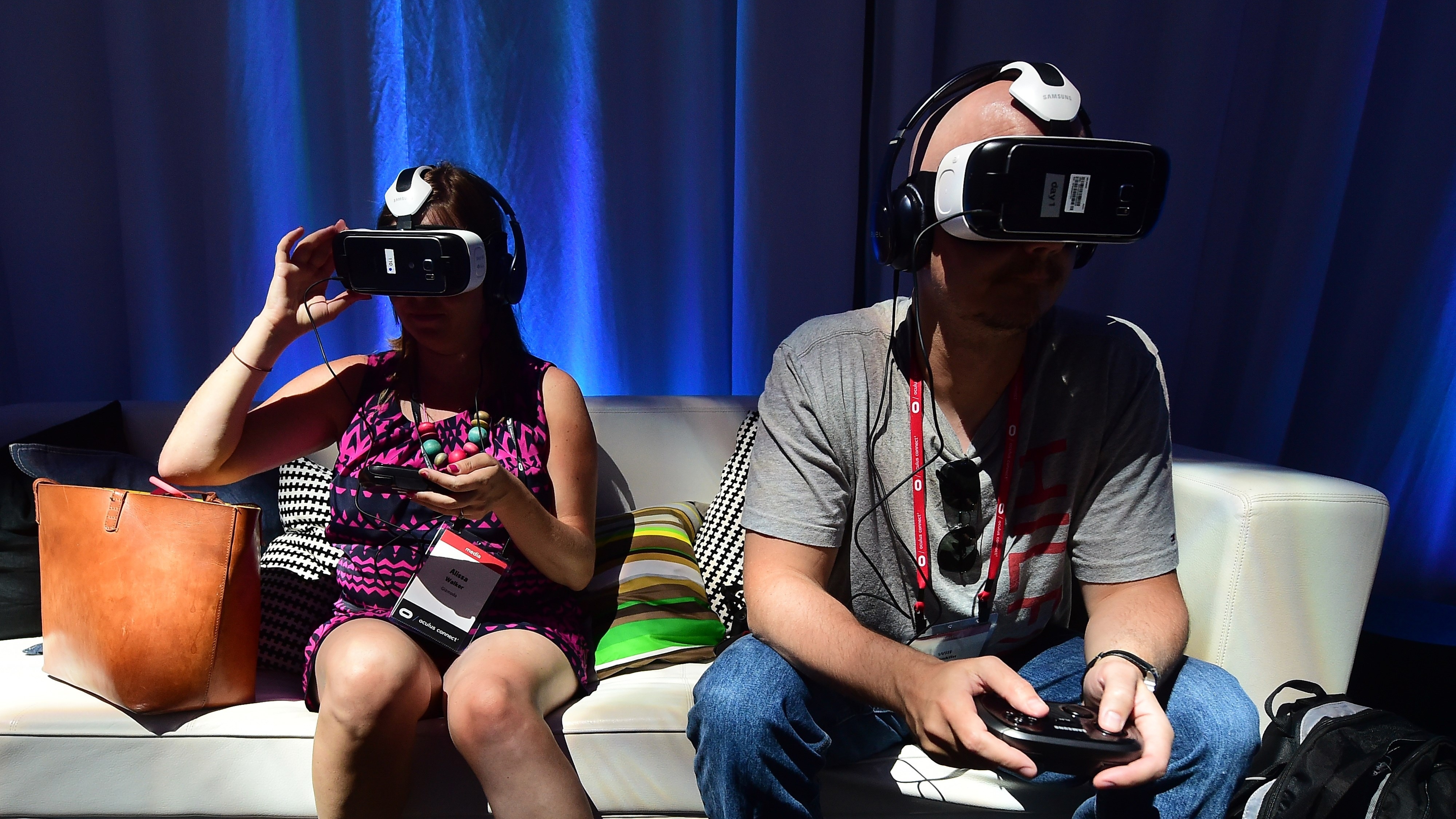 People sample the Oculus-made Samsung Gear VR Virtually Reality headset Sept. 24 in Hollywood, Calif., at the Oculus Connect 2 event. (AFP/Getty Images)