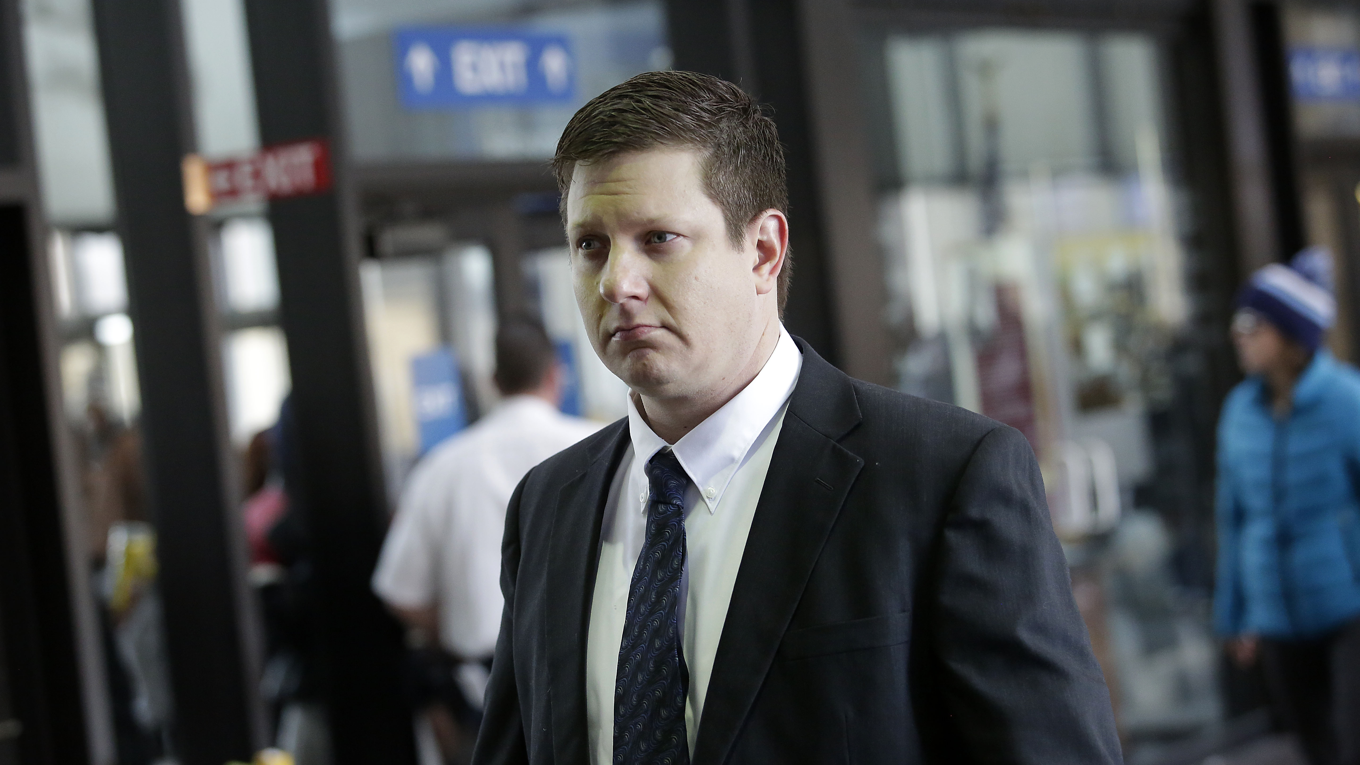Chicago police Officer Jason Van Dyke, who was charged with murder last month in the shooting death of Laquan McDonald, arrives at the Cook County Criminal Court for a status hearing on Dec. 18.