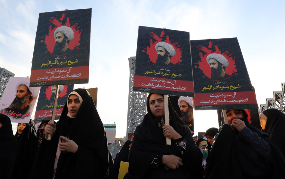 Iranian women in the capital Tehran demonstrate against the execution of a prominent Shiite Muslim cleric Nimr al-Nimr (seen on the signs). He was among 47 people beheaded by Saudi authorities on Saturday, a move that escalated tensions between the two countries. (Atta Kenare/AFP/Getty Images)