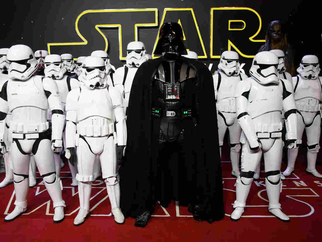 Actors dressed as Stormtroopers and Darth Vader pose at the European premiere of Star Wars: The Force Awakens in London on Dec. 16.
