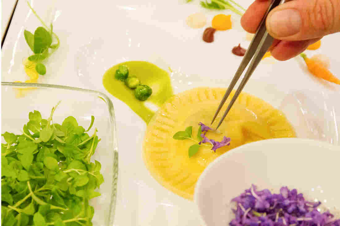 Microgreens and flowers grown by Chef's Garden are prepared by chefs from Walt Disney World.