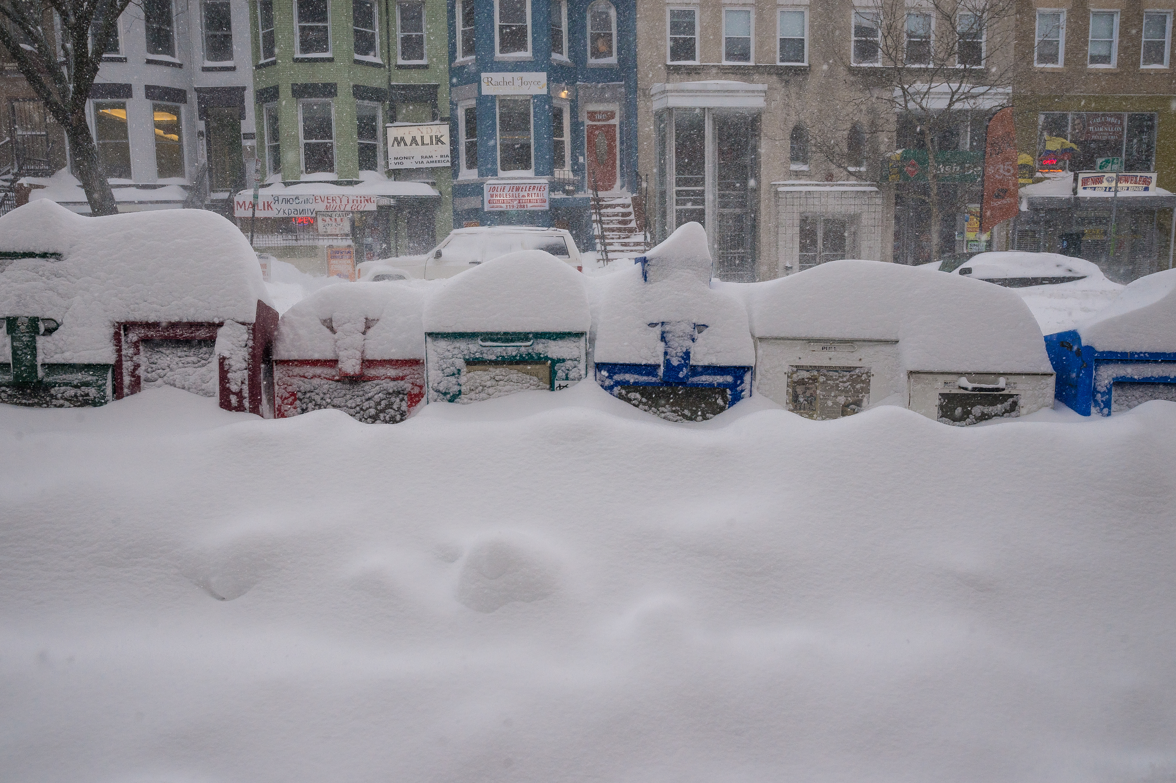 Washington, D.C., was one of many areas on the East Coast hit by a powerful winter storm this weekend. In the capital, it brought heavy snowfall, high winds and treacherous conditions. Farther south the storm delivered ice; on the coast, it turned high tide into floodwaters. (LightRocket via Getty Images)