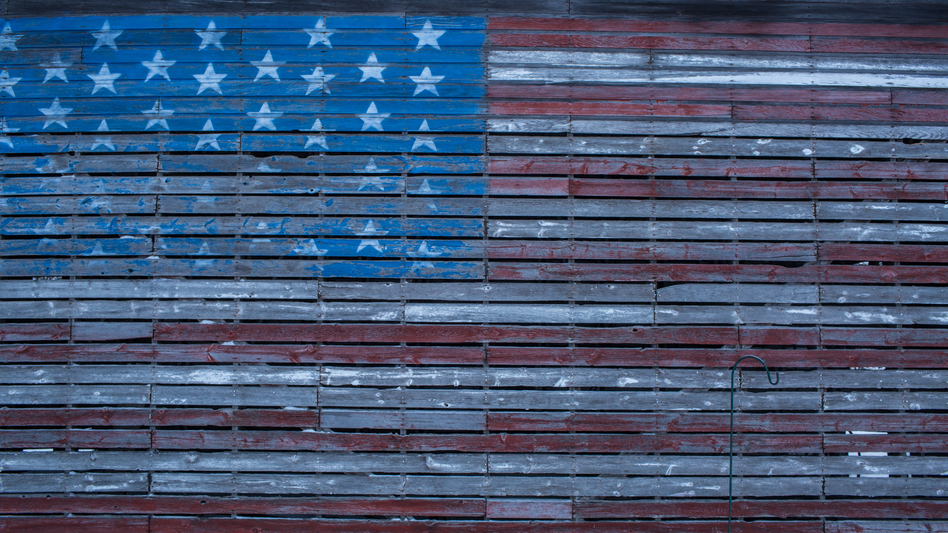 An American flag is painted on the side of a barn outside Webster City, Iowa. (Brendan Hoffman/Getty Images)