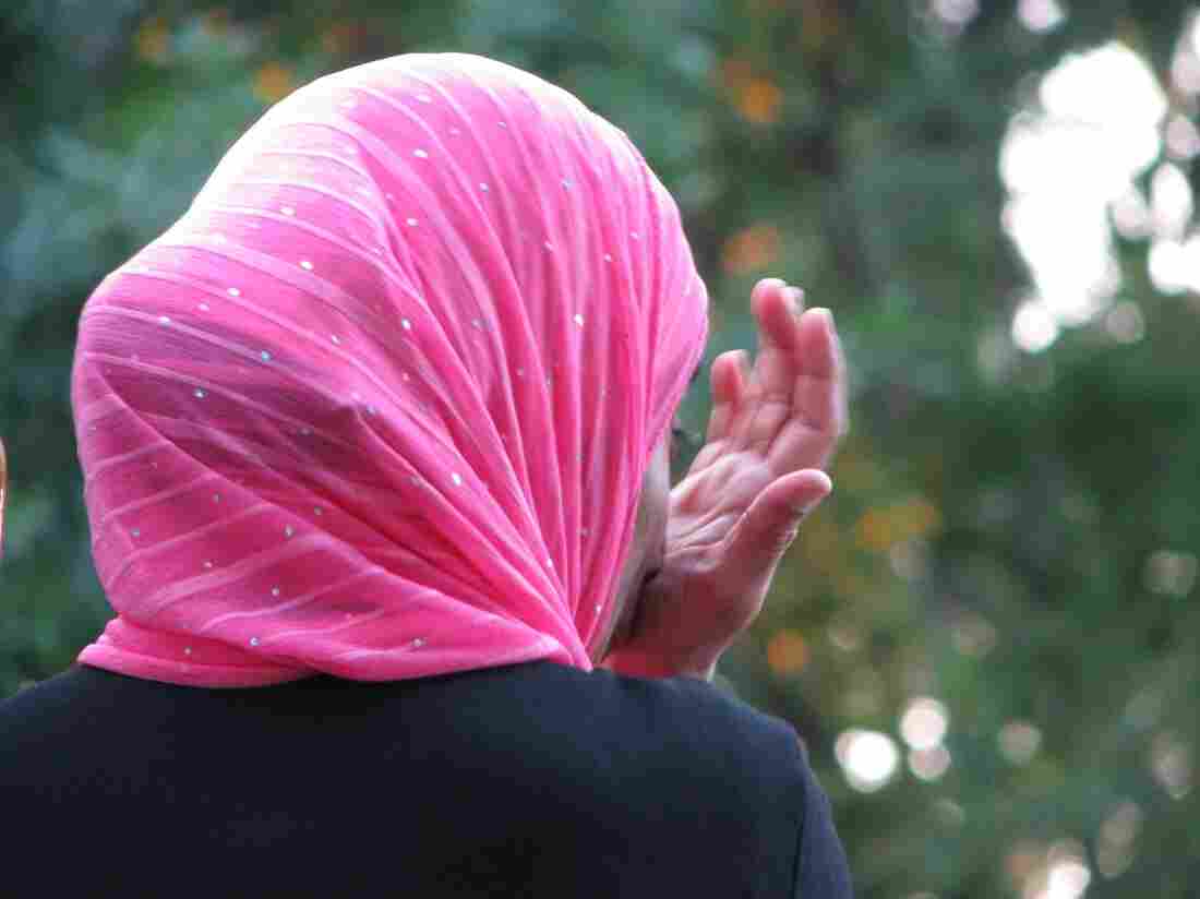 A woman wearing a headscarf.