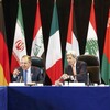 Russian Foreign Minister Sergey Lavrov (left) and Secretary of State John Kerry (second from left) attend the International Syria Support Group meeting in Munich, Germany, on Thursday along with members of the Syrian opposition and other officials.