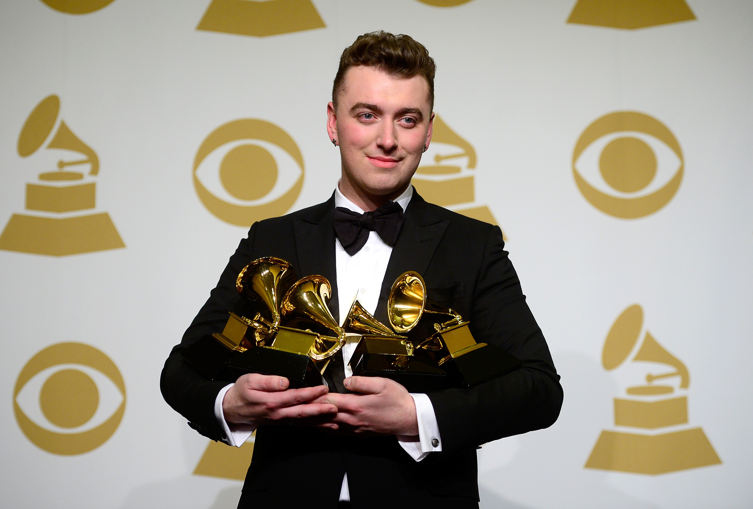 Singer-songwriter Sam Smith, winner of Record of the Year and Song of the Year, Best Pop Vocal Album and Best New Artist, poses in the press room during the Grammy Awards in 2015. (Getty Images)