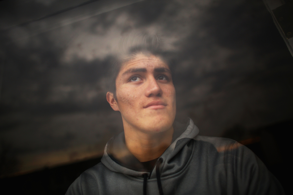 Alfredo Trejo, 18, came to the U.S. from El Salvador in 2014 as an unaccompanied minor and now lives with his aunt in Virginia. He applied for asylum, and, like many others, he says he fled persecution from gang members in San Salvador. (David Gilkey/NPR)