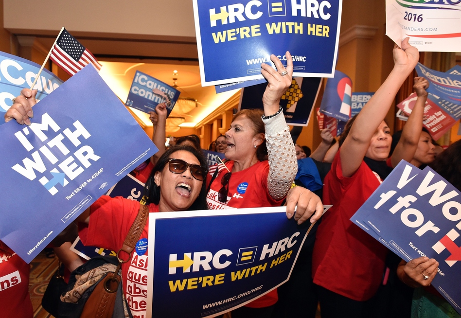 Naomi Barnes (left) shows her support for Democratic presidential candidate Hillary Clinton during the Nevada caucus in Las Vegas. (Josh Edelson/AFP/Getty Images)