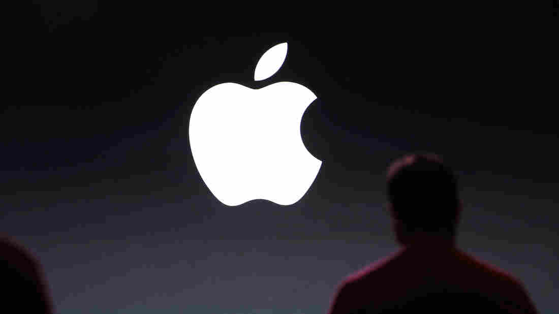 People attend the Apple keynote at the Flint Center for the Performing Arts in September 2014 in Cupertino, Calif.