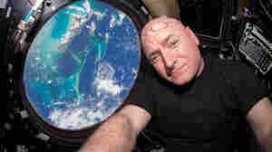NASA astronaut Scott Kelly takes a selfie inside the cupola, a special module that provides a 360-degree view of Earth. Kelly and Russian cosmonaut Mikhail Kornienko have spent nearly a year aboard the International Space Station.