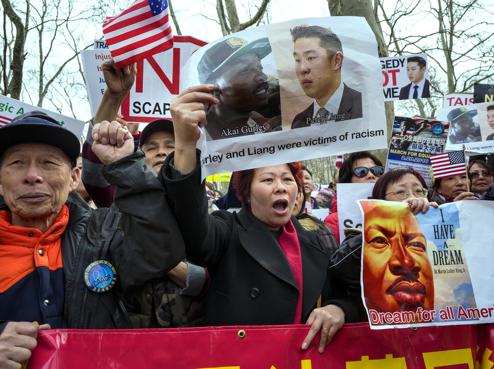 Protesters attend a rally in the Brooklyn borough of New York on Feb. 20 in support of a former NYPD Officer Peter Liang.