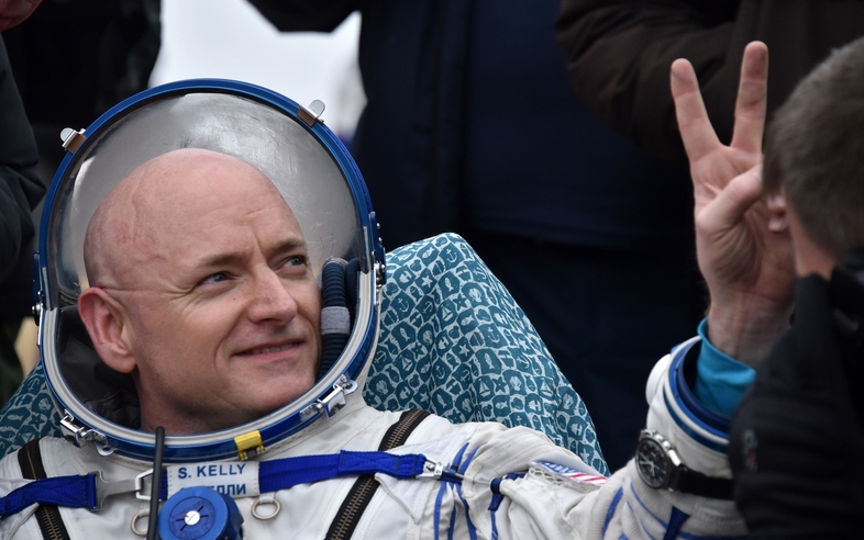 U.S. astronaut Scott Kelly shows a victory sign after landing safely on Earth after nearly a year in space. (Kirill Kudryavtsev/AFP/Getty Images)