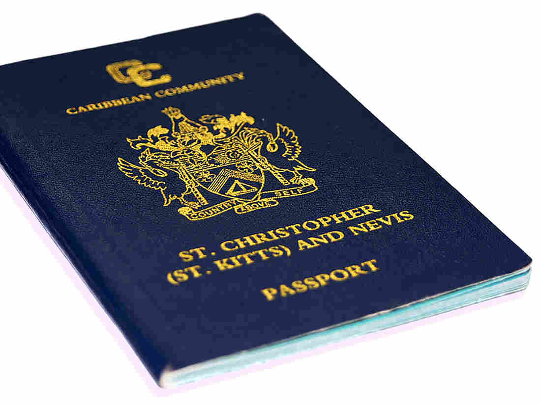 A St. Kitts and Nevis passport. St. Kitts has a "citizenship by investment" program in which passports can be bought and sold.