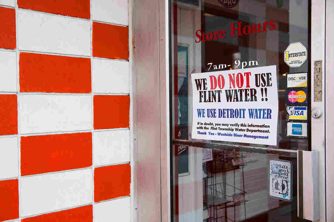 A sign at the Westside Diner in Flint, Mich., reassures customers that it serves uncontaminated water pulled from Detroit's drinking supply.