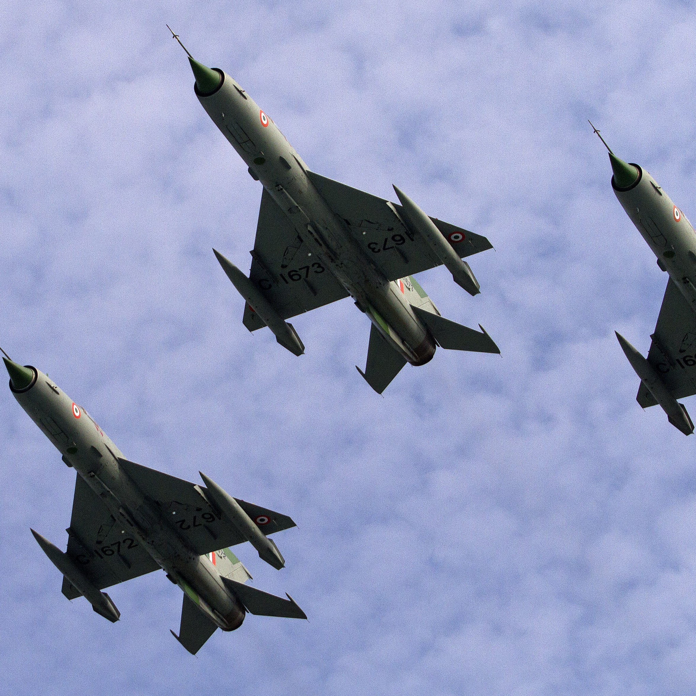 Indian Air Force jet fighter aircrafts fly over an airbase in 2014. Starting this summer, female fighter jet pilots will be allowed in the Air Force.